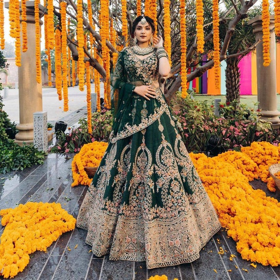 Green and gold bridal best sale lehenga