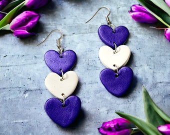 AFL Inspired Heart Earrings, Polymer Clay Earrings, Purple and White Triple Heart Dangles made in Footy Colours.