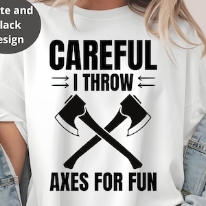 May include: White t-shirt with a black graphic design. The design features the text "CAREFUL I THROW AXES FOR FUN" with crossed axes. The shirt has a crew neck and short sleeves.