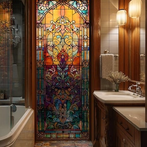 May include: A colorful stained glass window with an intricate floral design is set within a wooden door frame. The window features shades of orange, yellow, blue, and purple. The bathroom has a vintage aesthetic with wooden cabinetry and a patterned tile floor.