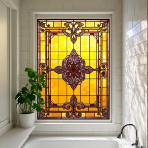May include: A stained glass window with a floral design in shades of yellow, purple, and brown. The window is rectangular with a white frame and is installed in a bathroom setting. A potted plant sits on the windowsill.