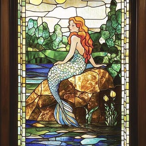 May include: A stained glass window depicting a mermaid sitting on a rock with a blue tail and long red hair. The background features a blue river, green trees, and two yellow suns.