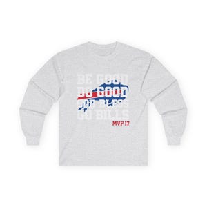 May include: A light gray long-sleeve shirt with the text "BE GOOD DO GOOD GOD BLESS GO BILLS MVP 17" in white, red, and blue. The design includes a stylized buffalo logo.