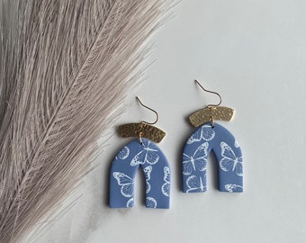Handmade polymer clay earrings blue and white arch butterfly earrings dangle gold and blue boho nature earrings statement gift for friend