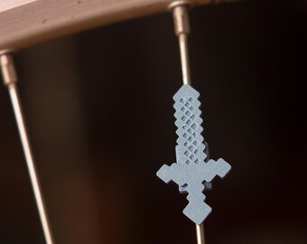 Sword Bike Spoke Decoration. Fits on bicycle wheel spokes. Accessory clips on bike spokes like spoke beads. Made in USA, Minecraft inspired