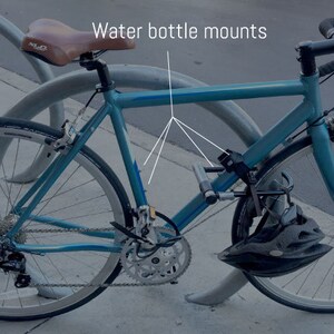 This picture shows where the water bottle mounts are on a standard bicycle, for attaching the Bike Sight AirTag holder. No water bottle cage necessary.