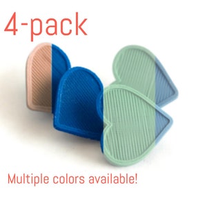May include: A 4-pack of heart-shaped coasters in blue, green, and pink. Multiple colors are available.