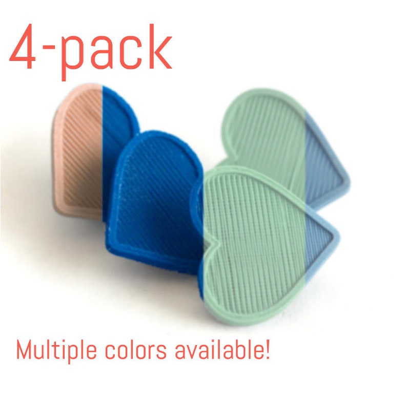 May include: A 4-pack of heart-shaped coasters in blue, green, and pink. Multiple colors are available.