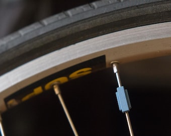 Letter "I" Bike Spoke Decoration. Fits on bicycle wheel spokes. Accessory clips onto bike spokes like spoke beads. Made in USA.