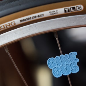 Bike Bus spoke decoration. Fits on bicycle wheel spokes. Accessory clips on bike spokes like beads & ornaments. Made in USA
