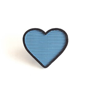 blue heart bike spoke decoration with hand painted edges - a plant-based accessory for bicycle spokes. Fits on mountain, road, kids, and adult bicycles and e-bikes.