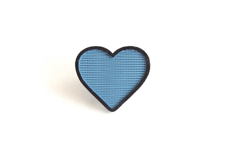 blue heart bike spoke decoration with hand painted edges - a plant-based accessory for bicycle spokes. Fits on mountain, road, kids, and adult bicycles and e-bikes.