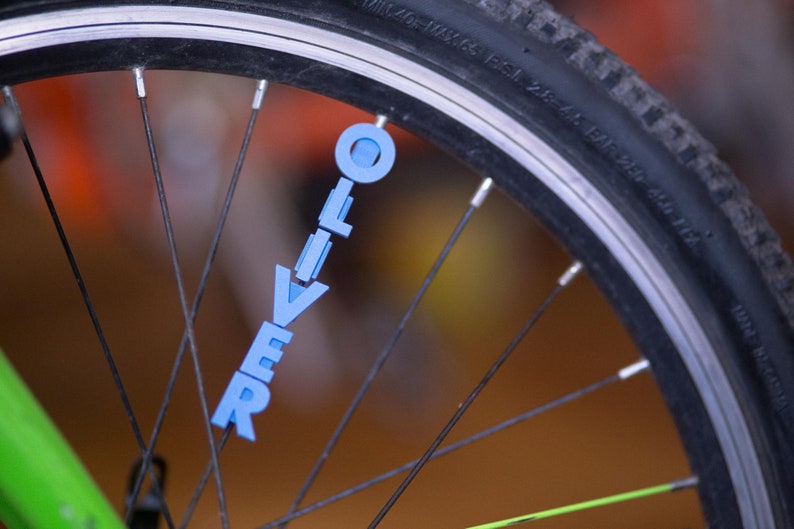 Bike Spoke Decoration Letters. 6 letter set. Fits on bicycle wheel spokes. Accessory clips onto bike spokes like spoke beads. Made in USA. image 3