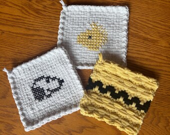 potholders (2) and trivet (1), eco-friendly, handmade, loomed, embroidered, Peanuts, Snoopy, Woodstock