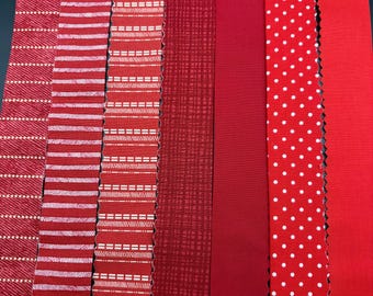 Fabric Quilt Binding SOLD by the YARD:  REDs - Swipe to see options.