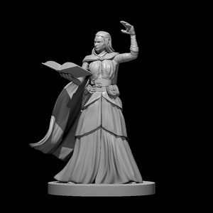 May include: A grey painted miniature figurine of a female elf wizard holding a book and casting a spell. She is wearing a long flowing robe with a belt and a pouch.
