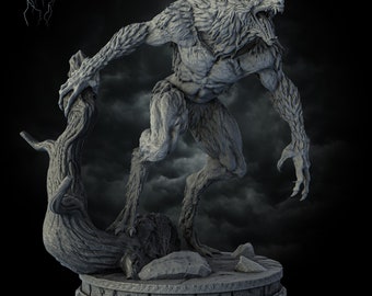 May include: A gray werewolf statue with a snarling expression, standing on a stone base with a tree trunk at its feet. The statue is part of the StormBorn Collectibles line.