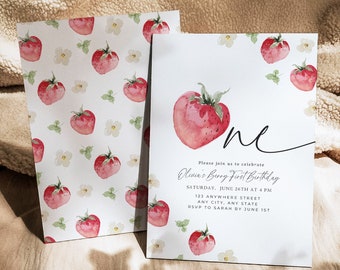 May include: A white and red invitation card with a watercolor illustration of a strawberry. The text on the card reads "Please join us to celebrate Olivia's Berry First Birthday, Saturday, June 26th at 4 PM, 123 Anywhere Street, Any City, Any State, RSVP to Sarah by June 1st". The bottom of the card reads "our dearest MOMENTS DESIGN CO."