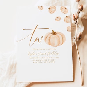 May include: A white invitation card with a watercolor pumpkin theme. The text reads "two" in a cursive font, along with event details for Taylor's Second Birthday. Additional pumpkins are scattered across the top.