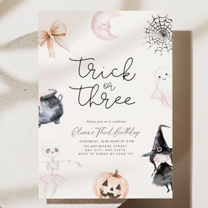 May include: A Halloween-themed birthday invitation featuring a watercolour illustration of a witch, a ghost, a cauldron, a pumpkin, a skeleton, a spider web, and a crescent moon. The text reads "Trick or Three" and "Olivia's Third Birthday".