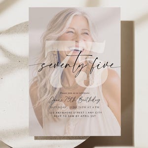 May include: A rectangular birthday invitation card featuring a photograph of a smiling person with blonde hair. The card displays the large text seventy five, along with the details: Joan's 75th Birthday, Saturday, June 26th at 4 PM, 123 Anywhere Street, Any City, RSVP to Sam by April 1st.