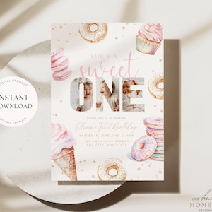 May include: A pink and gold first birthday invitation with a donut, cupcake, and ice cream cone theme. The invitation features a photo of a child in the number "one" with the text "She's a sweet one". The invitation also includes the text "Olivia's First Birthday" and the date and time of the party.