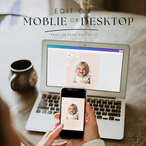 May include: A laptop and a smartphone displaying a digital invitation with a photo of a young girl and the text "Two". The invitation has a floral design with white flowers on a pink background. The text "Edit on Mobile or Desktop *Print or Send Digitally*" is displayed above the laptop.