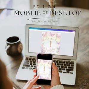 May include: A laptop and smartphone displaying a digital invitation for a first birthday. The invitation features a pastel rainbow background, butterflies, and the text "Emilia's 1st Birthday". The text "Edit on Mobile or Desktop" is at the top.