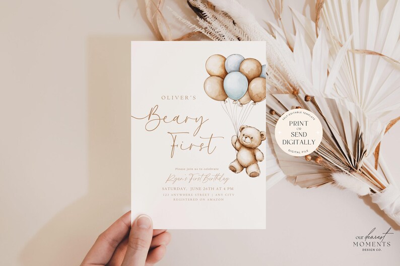 May include: A printable invitation for a first birthday party with a teddy bear holding balloons. The invitation is decorated with a watercolor illustration of a teddy bear holding balloons in shades of brown and blue. The text on the invitation reads "Oliver's Beary First" and includes the date and time of the party.
