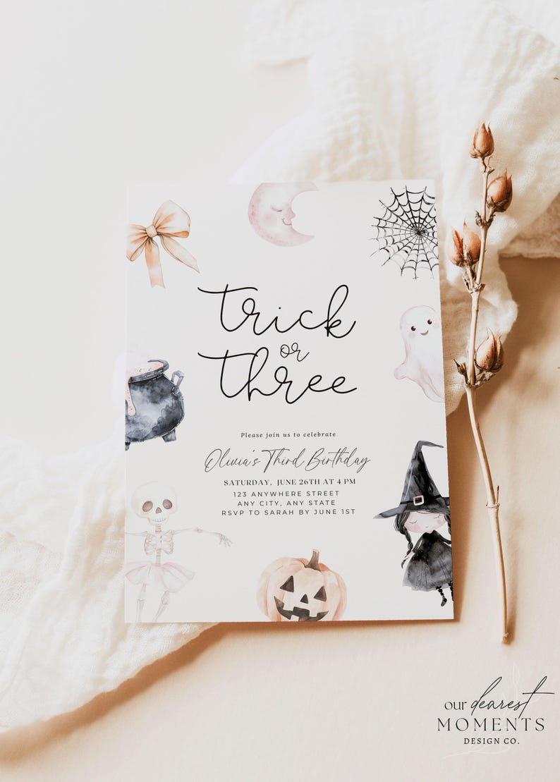 May include: A Halloween-themed birthday invitation with a watercolour illustration of a witch, a ghost, a pumpkin, a cauldron, a spider web, and a bow. The text reads "Trick or Three, Olivia's Third Birthday, Saturday, June 26th at 4 PM, 123 Anywhere Street, Any City, Any State, RSVP to Sarah by June 1st, our dearest Moments Design Co."
