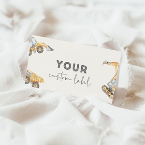 May include: A white card with the text "YOUR custom label" printed in black. The card is decorated with watercolor illustrations of yellow construction vehicles, including a dump truck and an excavator.