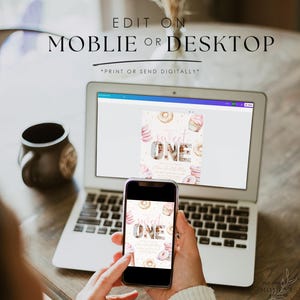 May include: A laptop and a smartphone displaying a pink and gold "Sweet One" first birthday party invitation with a donut and cupcake design. The text on the screen reads "Edit on Mobile or Desktop *Print or Send Digitally*"
