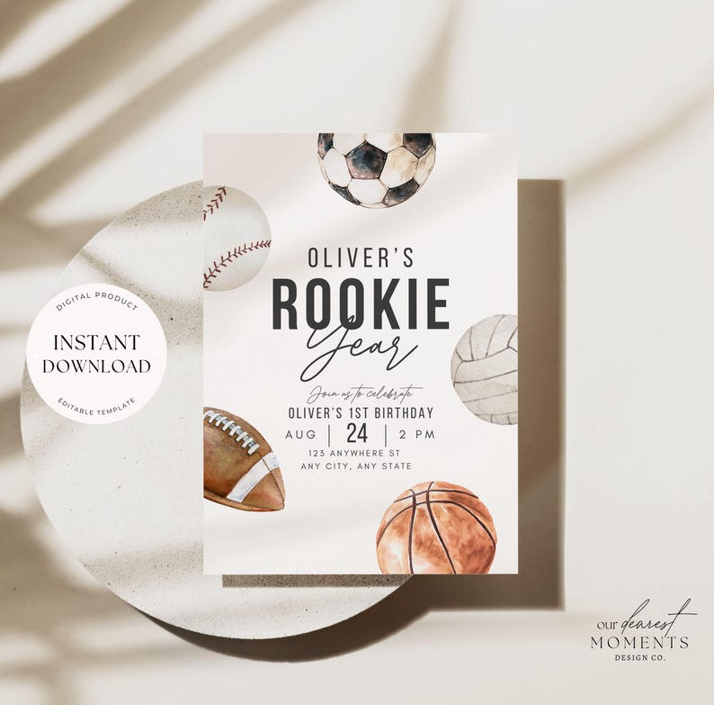 May include: A white invitation with a watercolor illustration of various sports balls, including a baseball, soccer ball, basketball, and volleyball. The text "Oliver's Rookie Year" is in black text with a white background. The invitation is for Oliver's 1st birthday party on August 24th at 2 PM. The address is 125 Anywhere St, Any City, Any State.