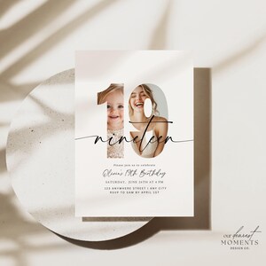 May include: A white invitation card with a black number 19 and the word "nineteen" in cursive script. The number 19 has two photos of people inside it. The text on the card reads "Please join us to celebrate Olivia's 19th Birthday, Saturday, June 26th at 4 PM, 123 Anywhere Street | Any City, RSVP to Sam by April 1st". The bottom of the card reads "our dearest MOMENTS DESIGN CO."