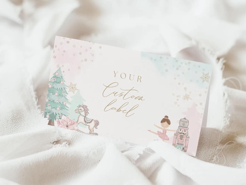 May include: A custom label with a watercolor design featuring a Christmas tree, rocking horse, ballerina, and nutcracker. The label has a soft pink and blue watercolor background with the words "YOUR Custom label" in elegant script.