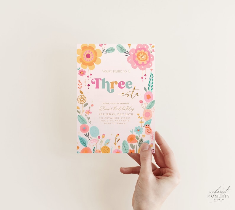 May include: A pink and white floral birthday invitation with the text "You're invited to a Three-esta Livin's third birthday" and details for the party. The invitation is decorated with colorful flowers and a bird.