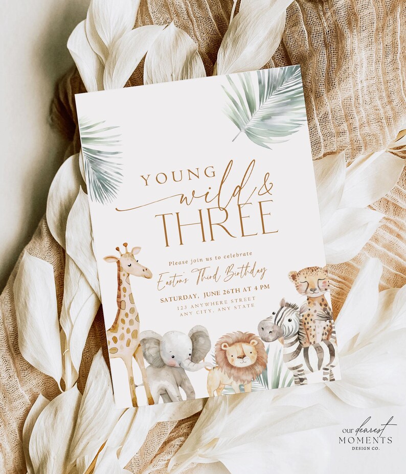 May include: A white invitation card with a jungle theme. The text reads "Young Wild & Three" with a brown giraffe, elephant, lion, and zebra illustration. The invitation is for Easton's Third Birthday party.