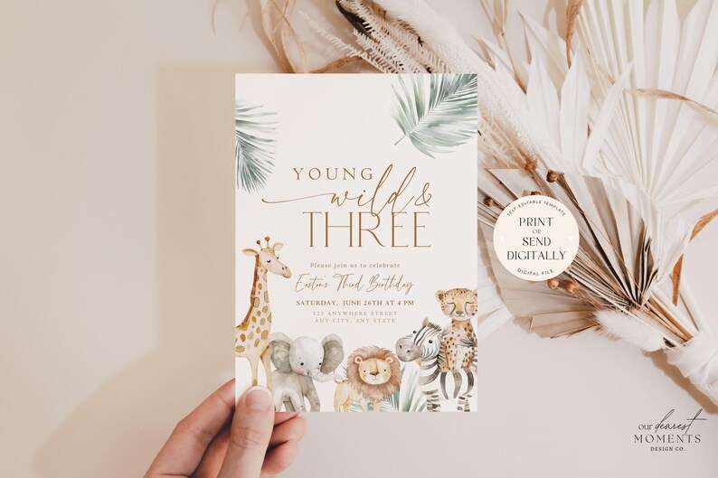May include: A printable invitation for a third birthday party with a jungle theme. The invitation features a giraffe, elephant, zebra, lion, and leopard with the text "Young Wild & Three" in gold lettering.