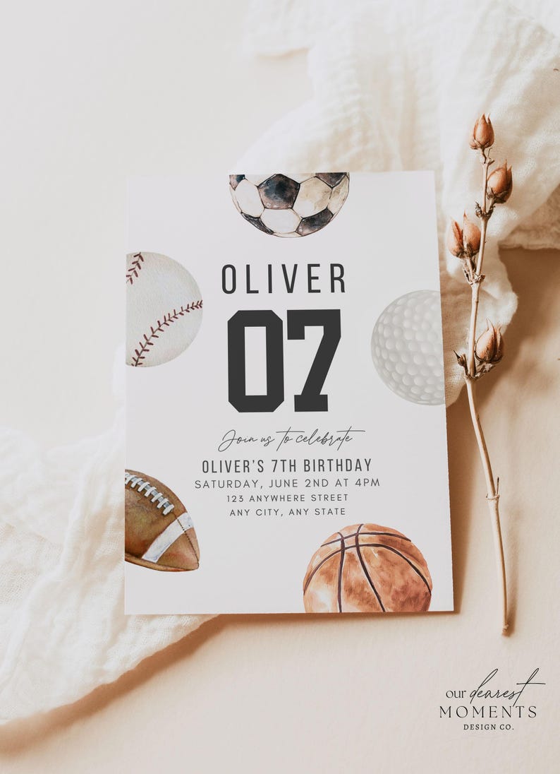May include: A rectangular birthday invitation card featuring watercolour illustrations of a football, baseball, golf ball, American football, and basketball. The text reads OLIVER 07, Join us to celebrate, OLIVER'S 7TH BIRTHDAY, SATURDAY, JUNE 2ND AT 4PM, 123 ANYWHERE STREET, ANY CITY, ANY STATE.