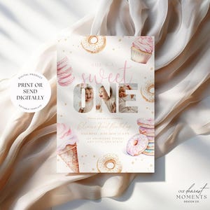 May include: A pink and gold first birthday invitation with a donut, cupcake, and ice cream cone theme. The invitation says "She's a sweet one" and includes space for a photo. The text also says "Olivia's First Birthday" and includes the date, time, and location of the party.