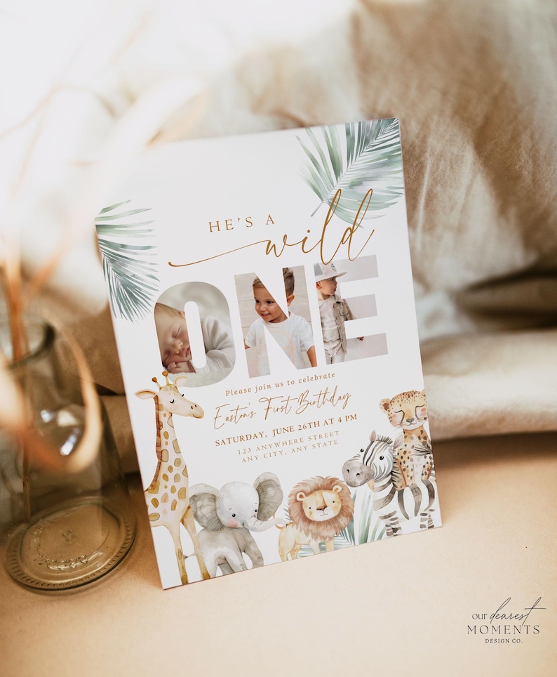 May include: A rectangular invitation card with the text "He's a Wild One" and the word "ONE" in large letters. The card features photos of a baby and illustrations of safari animals, including a giraffe, elephant, and lion.