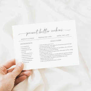 May include: Printable recipe card for peanut butter cookies. The card lists the ingredients and directions for making the cookies. It includes serving size, prep time, and baking time.