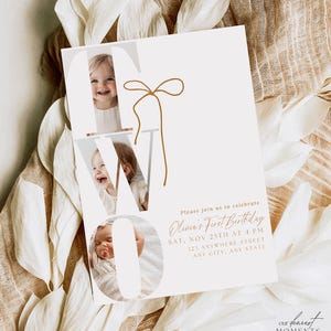 May include: A white invitation card with the word "TWO" in large, stylized letters, each letter containing a photo of a baby. The card includes text announcing a first birthday celebration, with a gold bow graphic.