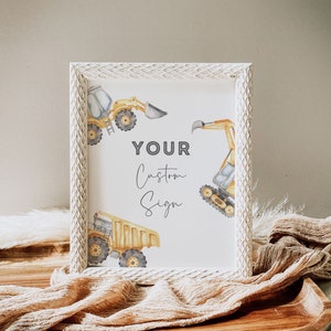 May include: A white framed sign with a watercolor illustration of construction vehicles. The sign says "YOUR Custom Sign".