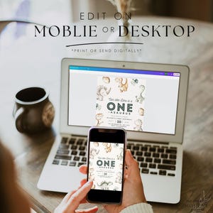 May include: A laptop and a smartphone both display a dinosaur-themed first birthday invitation with the text "Our little Dino is a ONE-ASAURUS". The text "EDIT ON MOBILE OR DESKTOP *PRINT OR SEND DIGITALLY*" is displayed above the laptop.