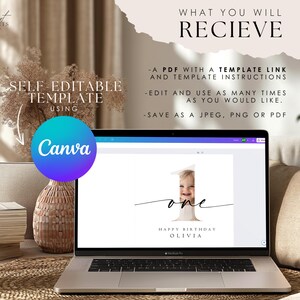 May include: A laptop computer displaying a Canva design template for a first birthday. The template features a white background with a large number "1" with a photo of a baby inside the number. The text "one" is written in a cursive font below the number. The text "Happy Birthday Olivia" is written below the number and text.
