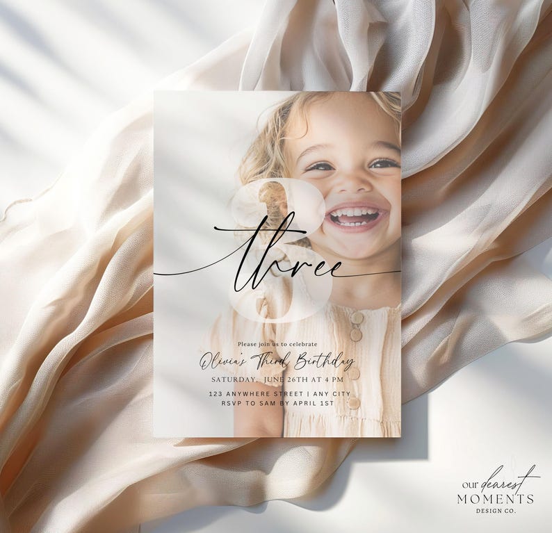 May include: A birthday invitation with a photo of a young girl smiling. The invitation is for a third birthday party and includes the text "Please join us to celebrate Olivia's Third Birthday, Saturday, June 26th at 4 PM, 123 Anywhere Street | Any City, RSVP to Sam by April 1st".