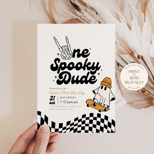 May include: A rectangular invitation card featuring the text One Spooky Dude, a skeleton hand making a rock sign, and a ghost wearing an orange beanie on a skateboard. The bottom border has a black and white checkered pattern. Text includes date, time, and location details.