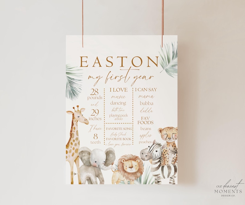 May include: A printable first birthday milestone chart for a baby boy named Easton. The chart features a jungle theme with illustrations of a giraffe, elephant, lion, and zebra. It includes details like weight, height, favorite foods, and things the baby can say.