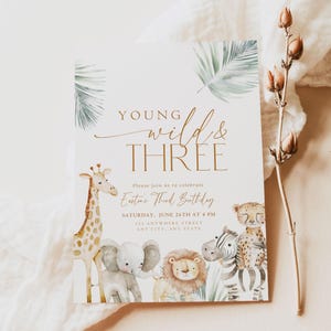 May include: A jungle-themed birthday invitation with a watercolor illustration of a giraffe, elephant, lion, zebra, and cheetah. The text reads "Young Wild & Three" and "Easton's Third Birthday".